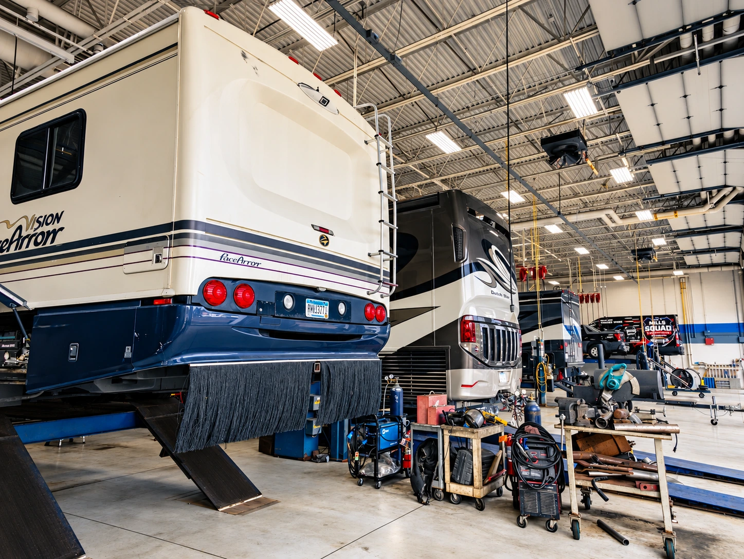 Motorhomes inside the Mills RV service garage